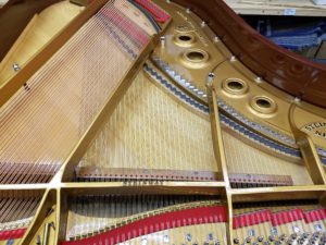 restringing a piano