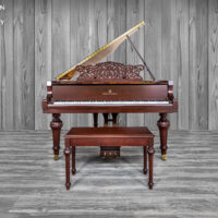 A satin Mahogony story & clark baby grand piano located at hamilton piano company in west palm beach