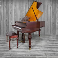 A satin Mahogony story & clark baby grand piano located at hamilton piano company in west palm beach