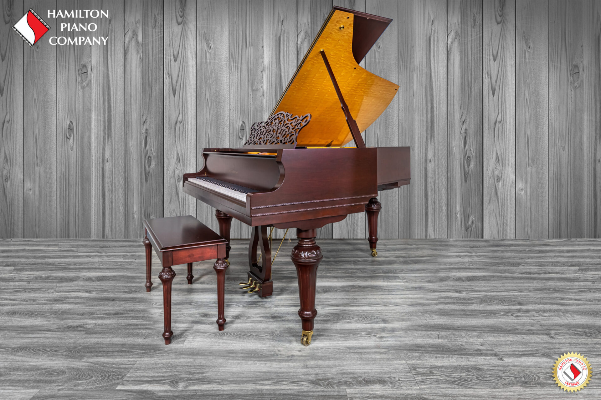 A satin Mahogony story & clark baby grand piano located at hamilton piano company in west palm beach