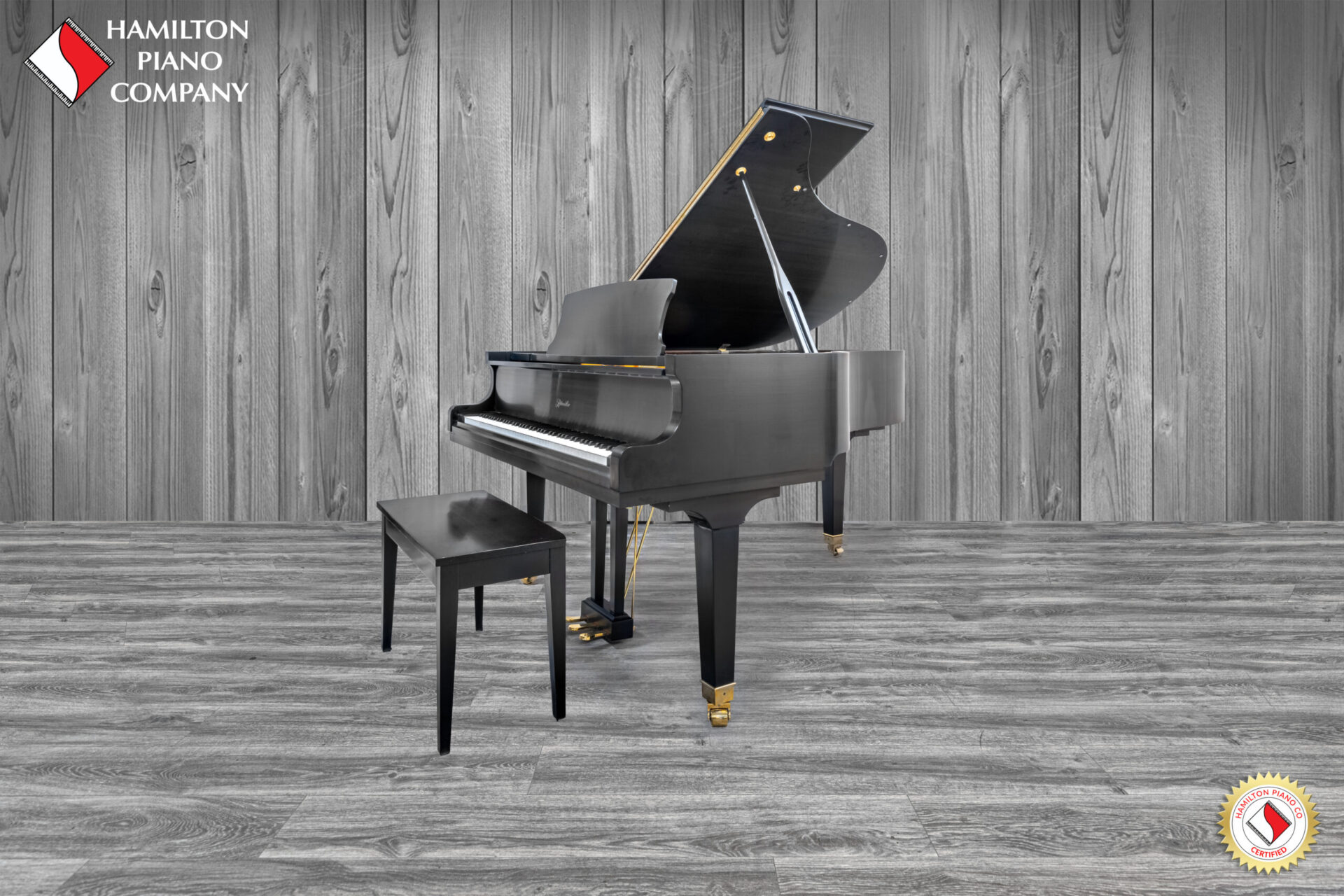 a black grand piano from hamilton piano company in south florida