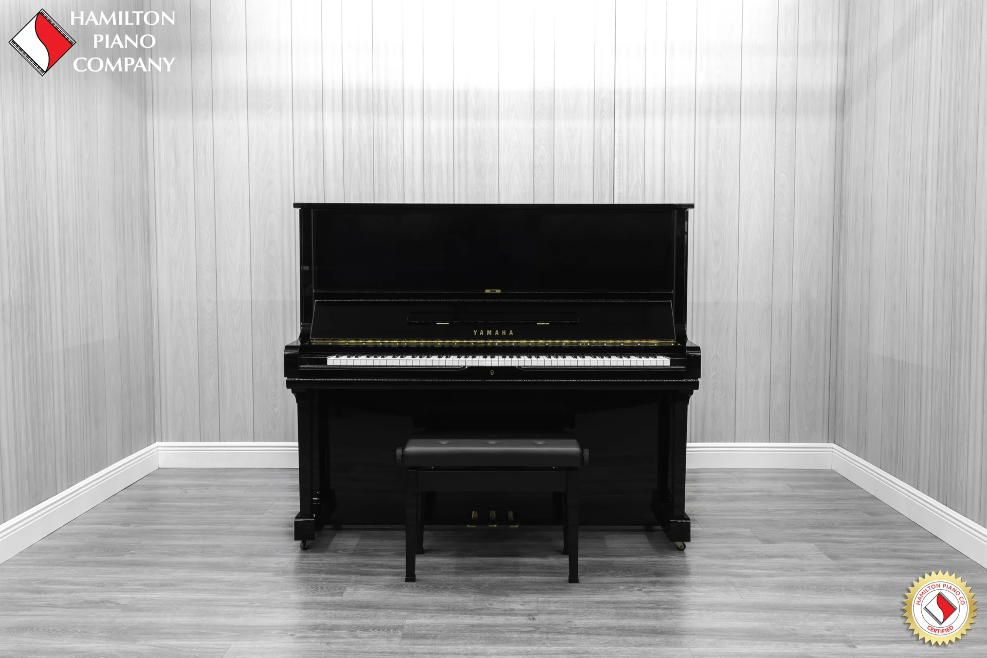 Yamaha U3 vertical piano in a high polish ebony finish