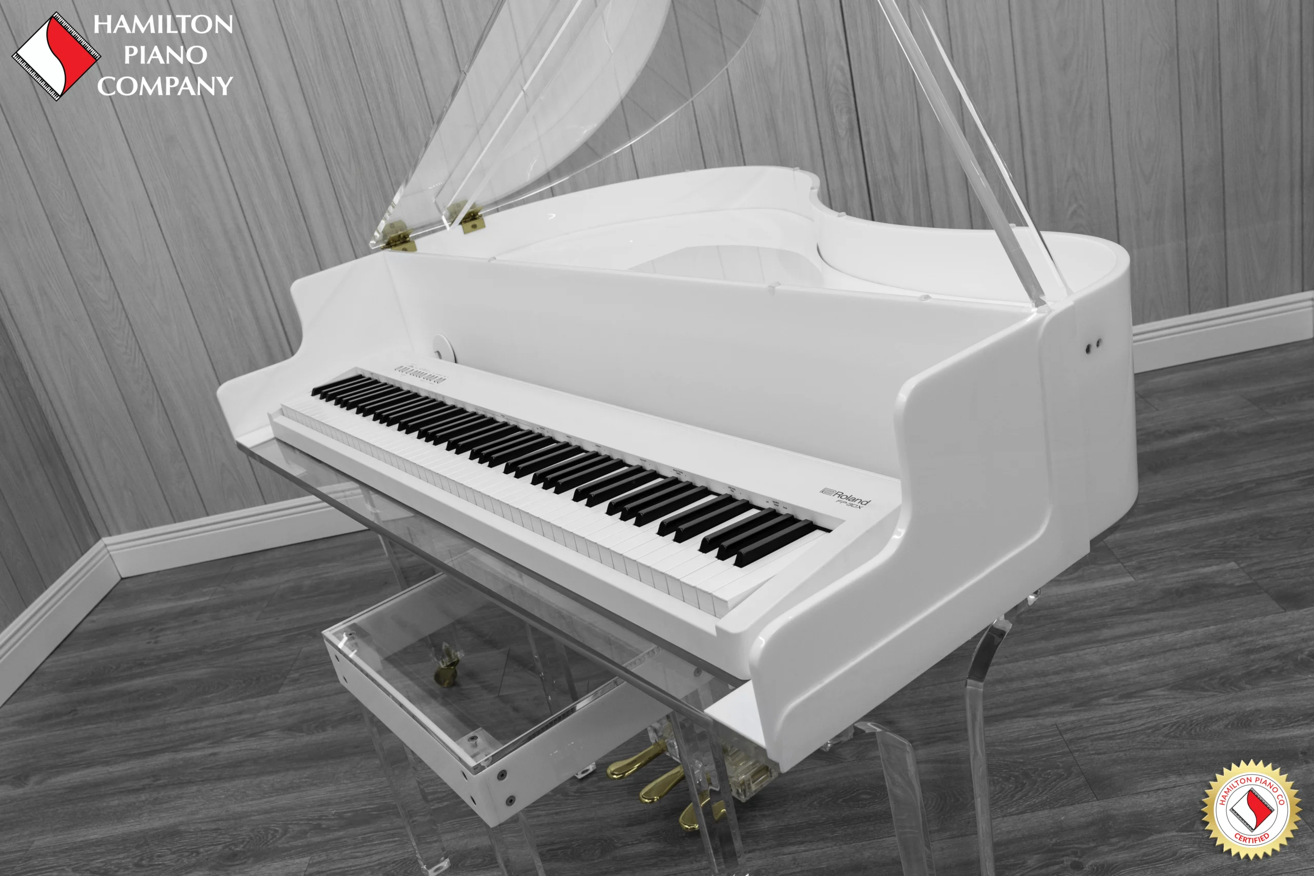 Roland FP-30X digital piano in a white and transparent acrylic shell with full-size weighted keys and modern design