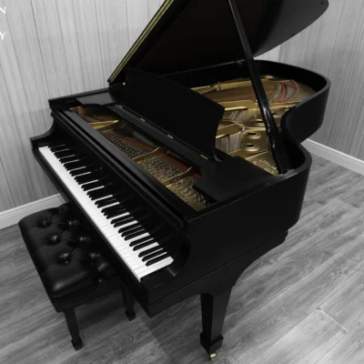 1984 Steinway B Grand Piano in satin ebony finish with bench.