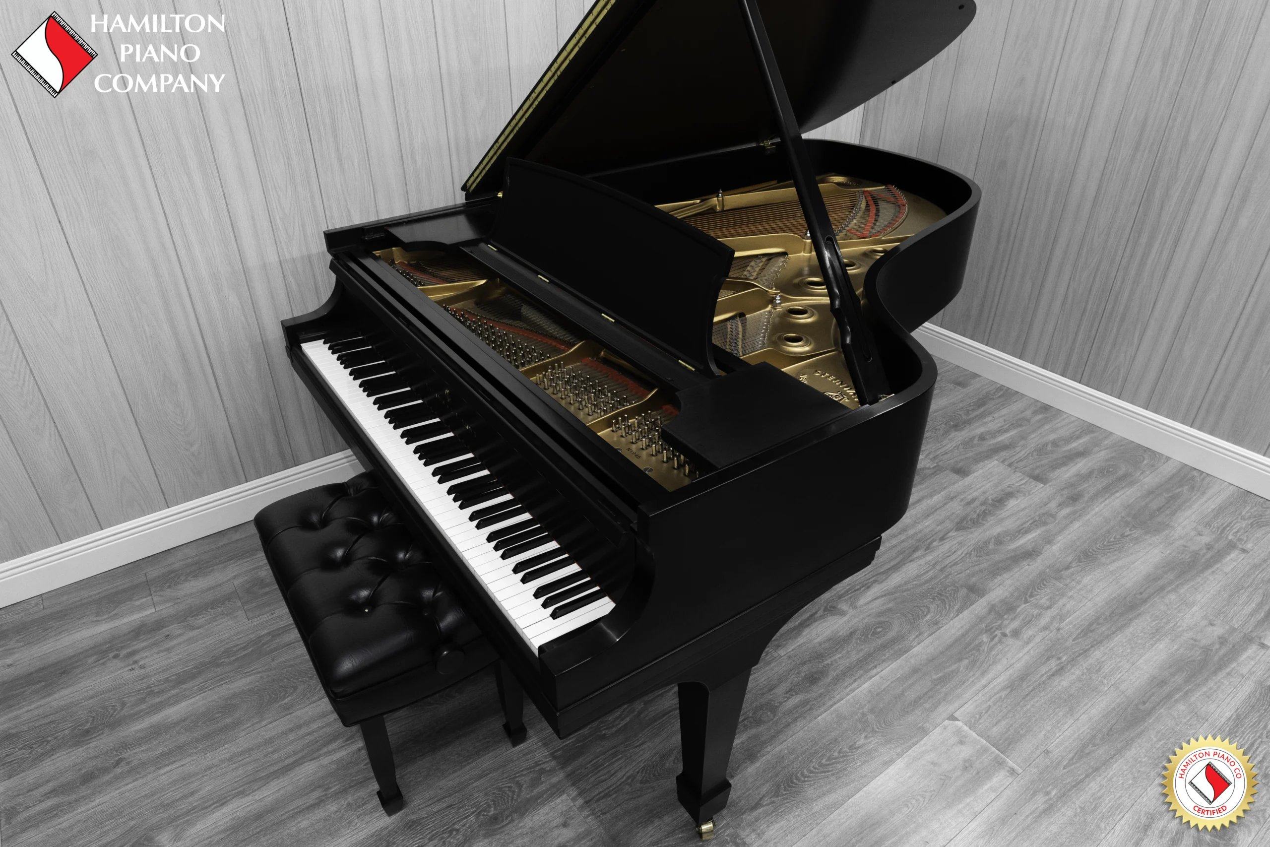 1984 Steinway B Grand Piano in satin ebony finish with bench.