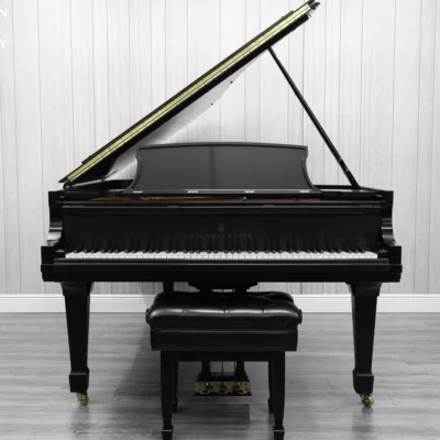 1984 Steinway B Grand Piano in satin ebony finish with bench.
