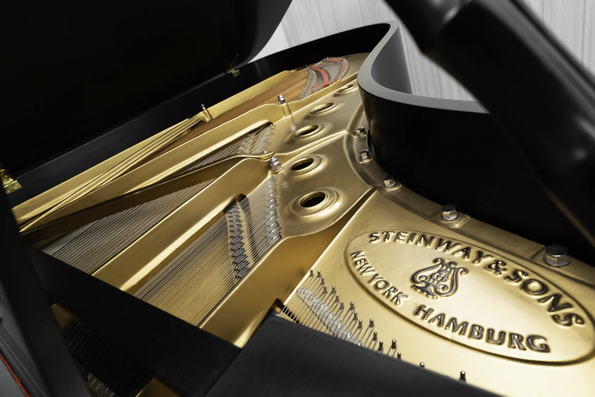 1984 Steinway B Grand Piano in satin ebony finish. This image shows the interior of the piano including the harp and strings.