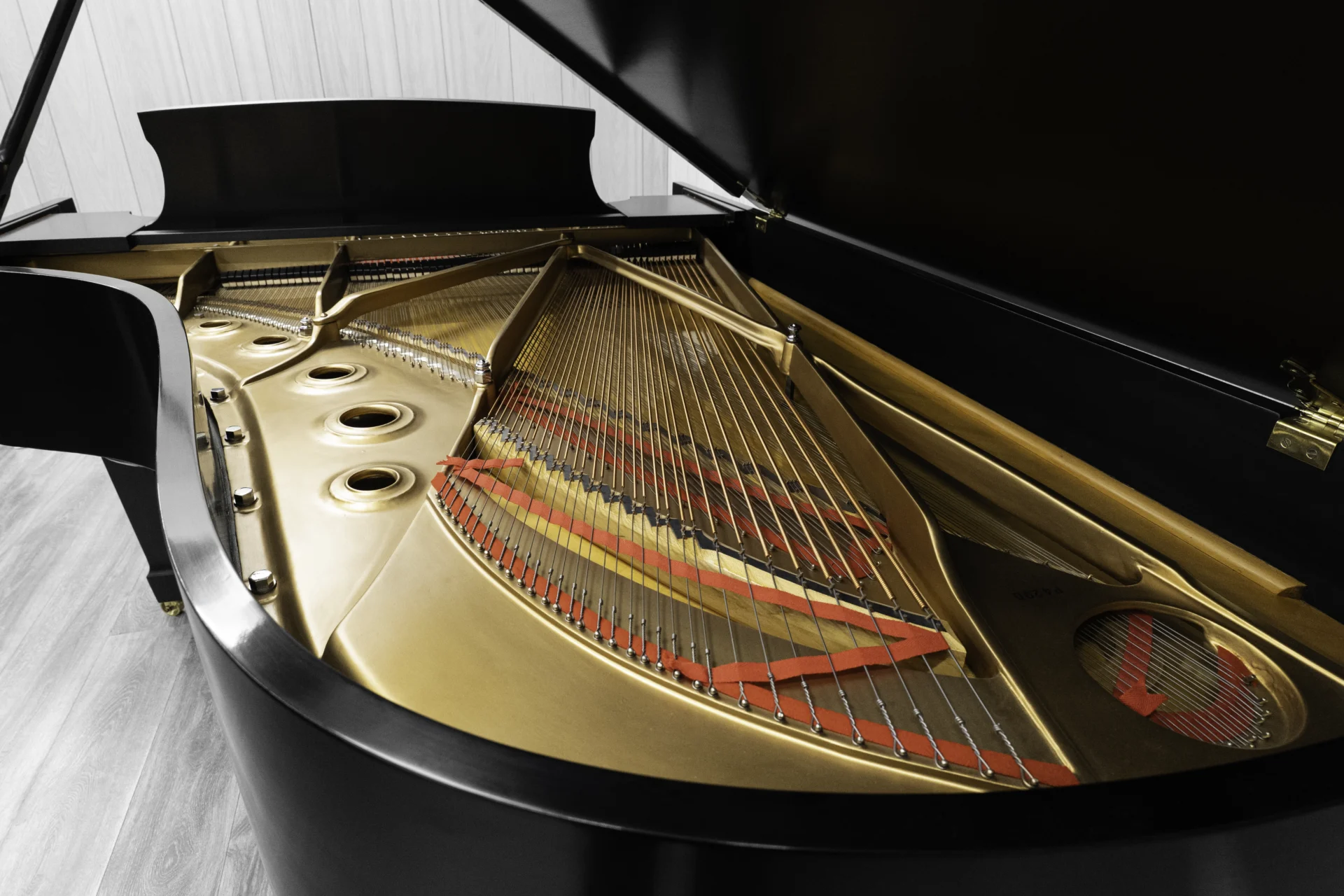 1984 Steinway B Grand Piano in satin ebony finish. This image shows the interior of the piano including the harp and strings.