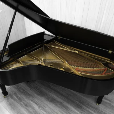 1984 Steinway B Grand Piano in satin ebony finish. This image shows the interior of the piano including the harp and strings.