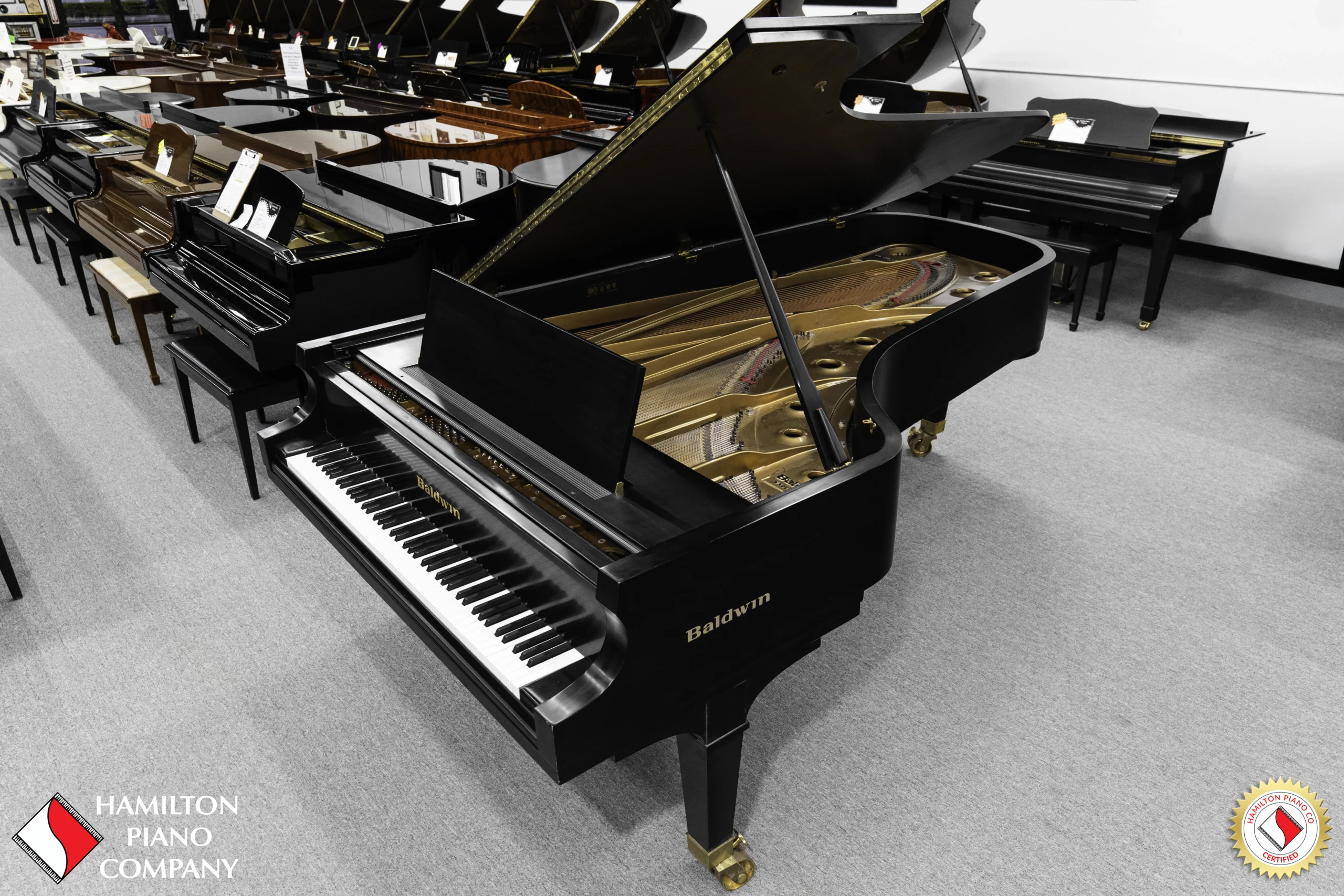 A 9ft Baldwin SD concert grand piano in hand-rubbed satin ebony finish