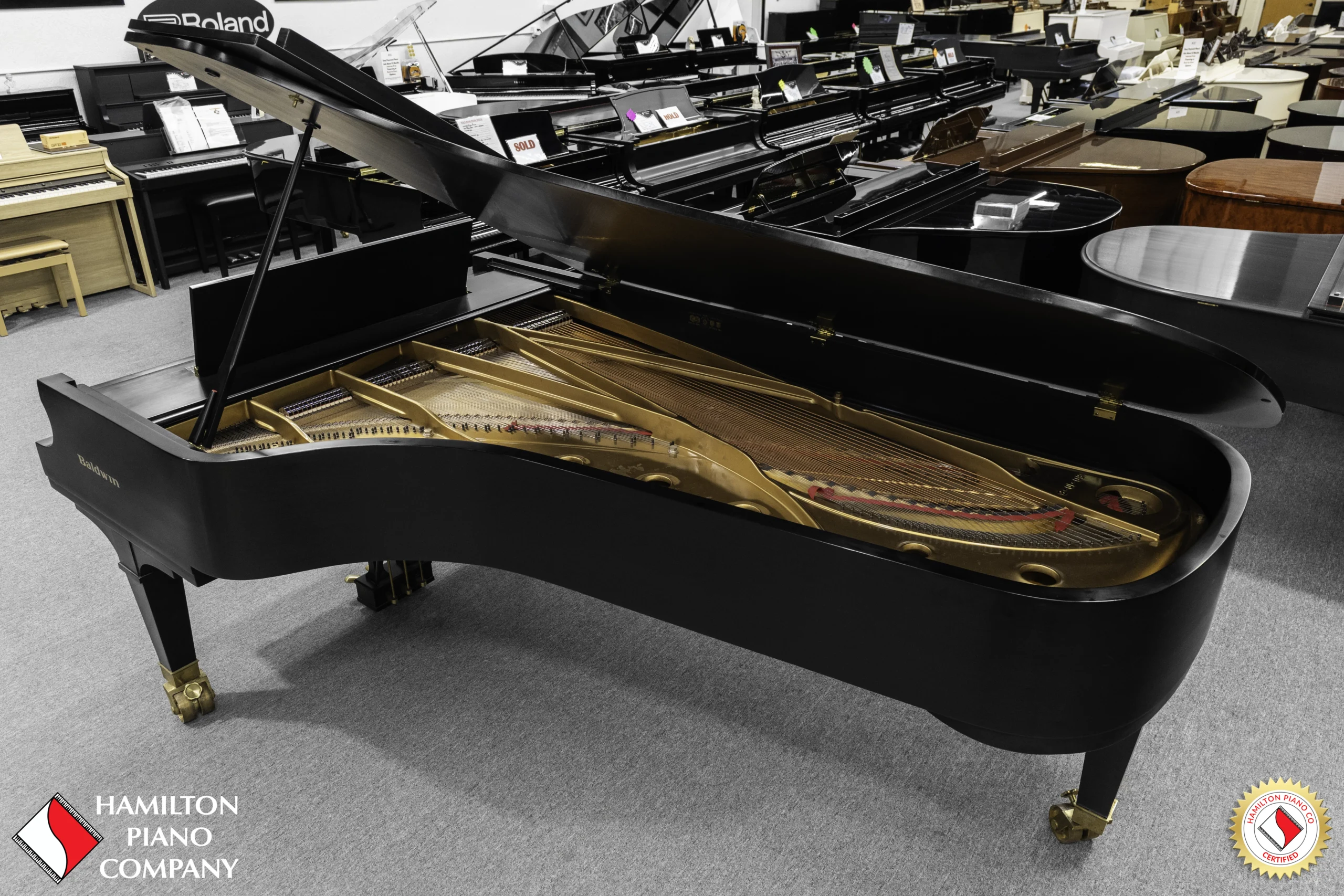 A 9ft Baldwin SD concert grand piano in hand-rubbed satin ebony finish