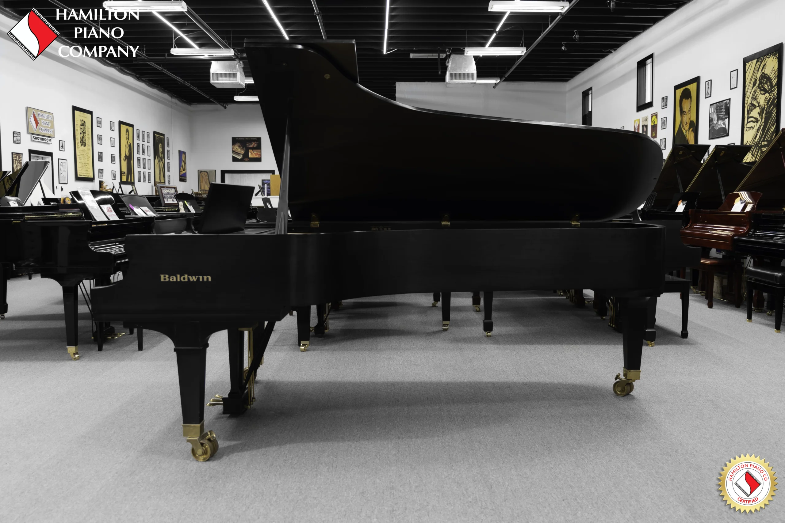 A 9ft Baldwin SD concert grand piano in hand-rubbed satin ebony finish