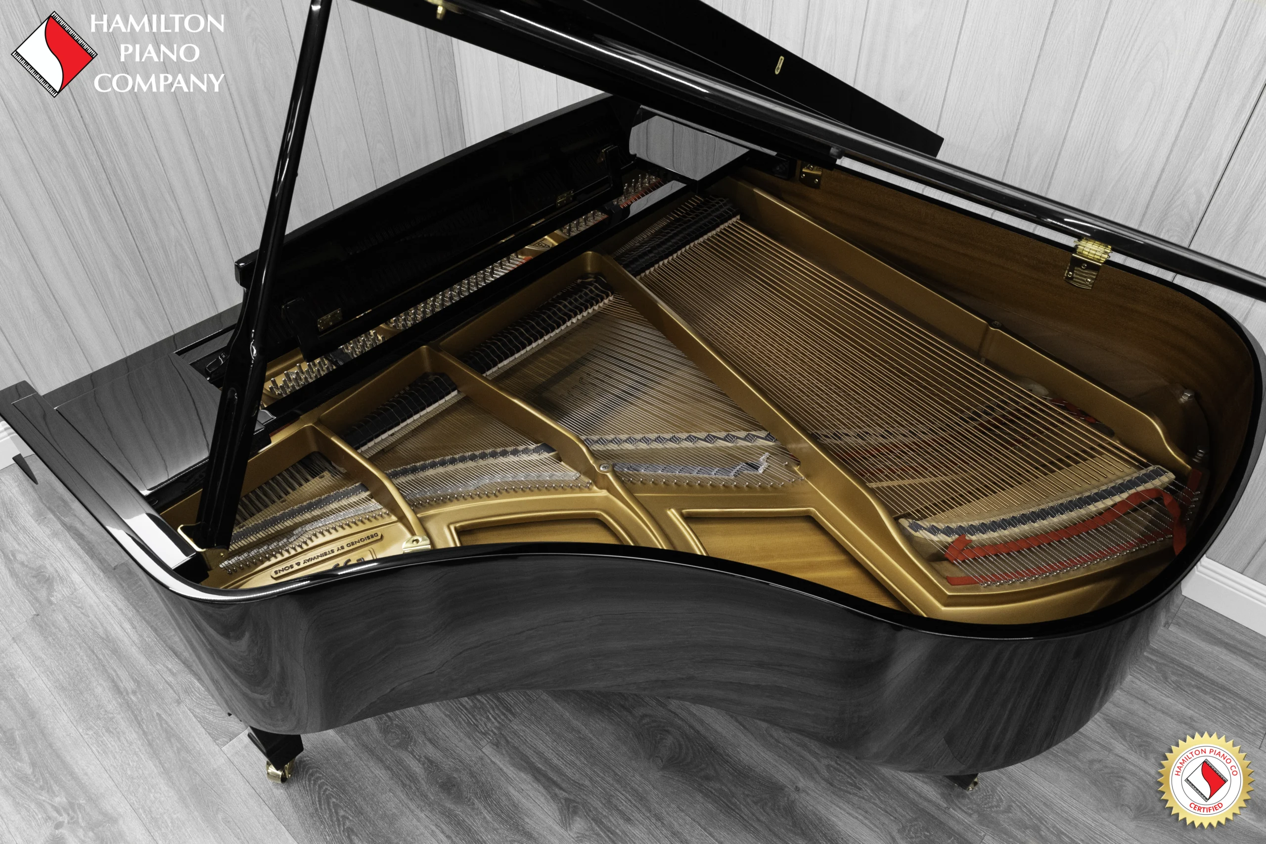 an Essex EGP-161 baby grand piano in a high polish ebony finish