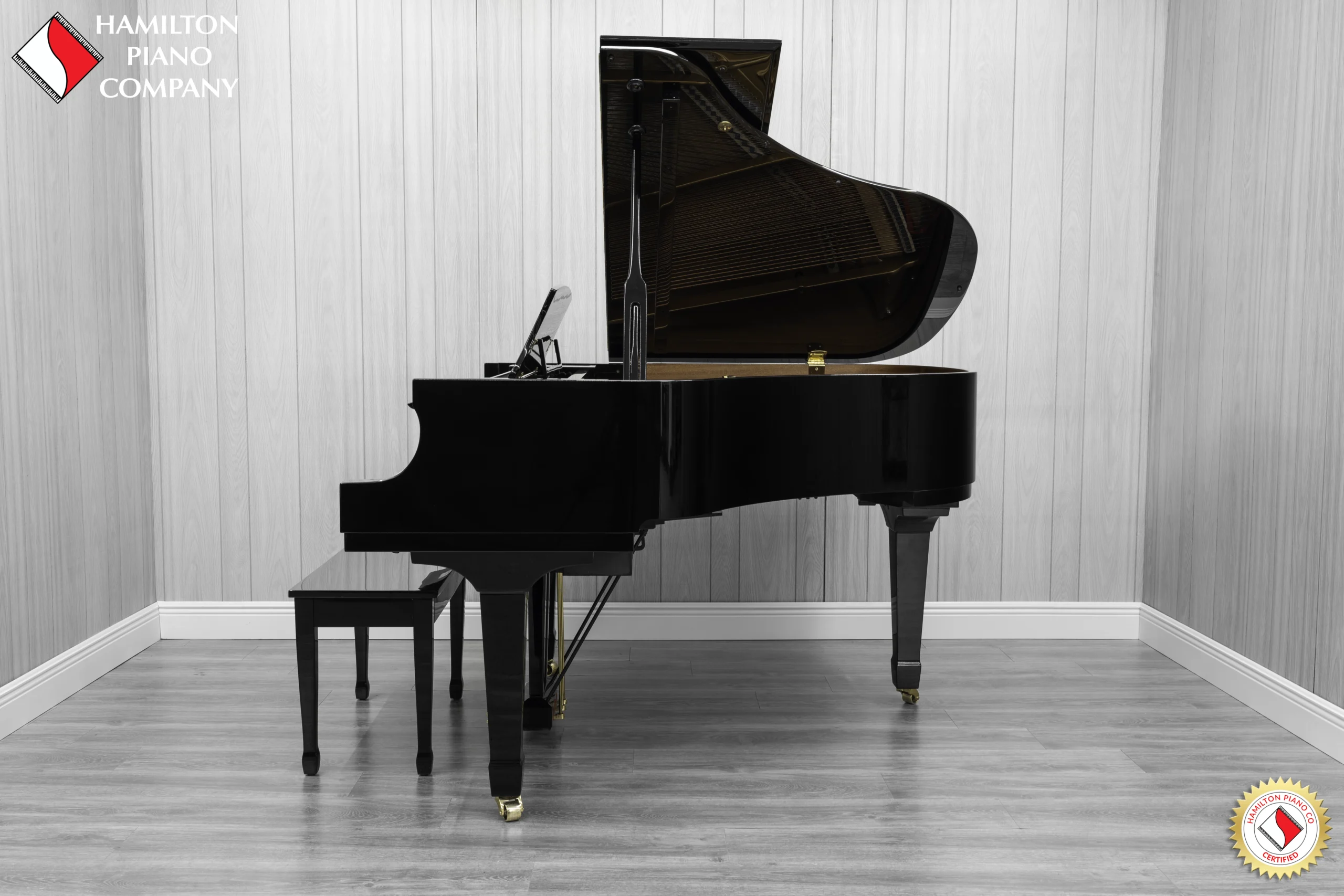 an Essex EGP-161 baby grand piano in a high polish ebony finish