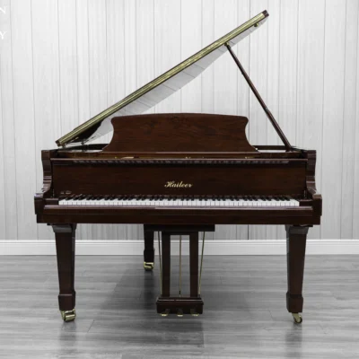 Haileer baby grand piano in high polish mahogany.