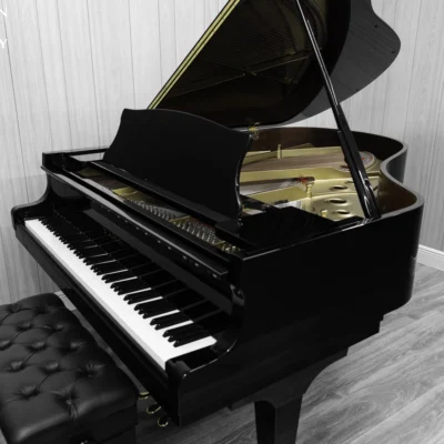 A Kawai RX-3 grand piano in a high-polish ebony finish.
