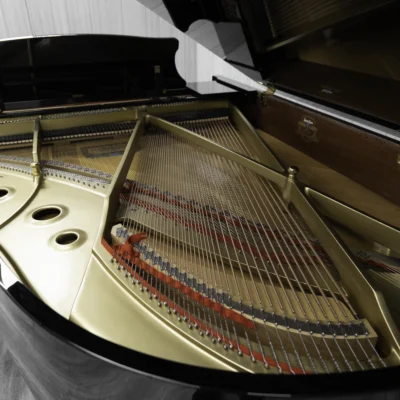 A Kawai RX-3 grand piano in a high-polish ebony finish.