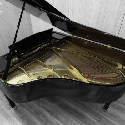 A Kawai RX-3 grand piano in a high-polish ebony finish.