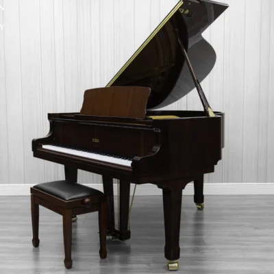 Petrof baby grand piano in high polish mahogany finish