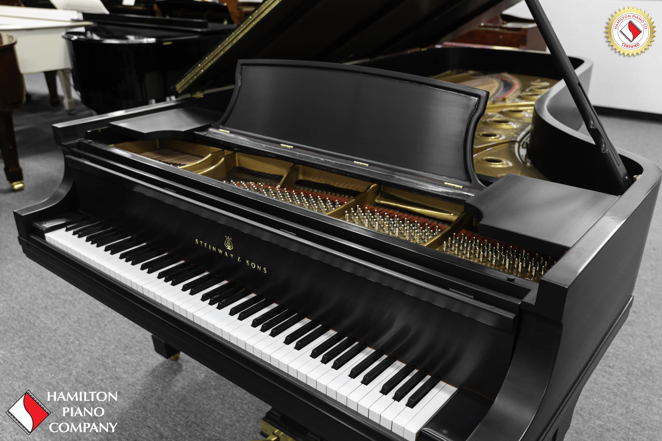 A 9ft Steinway D Concert Grand Piano in hand-rubbed satin ebony finish.