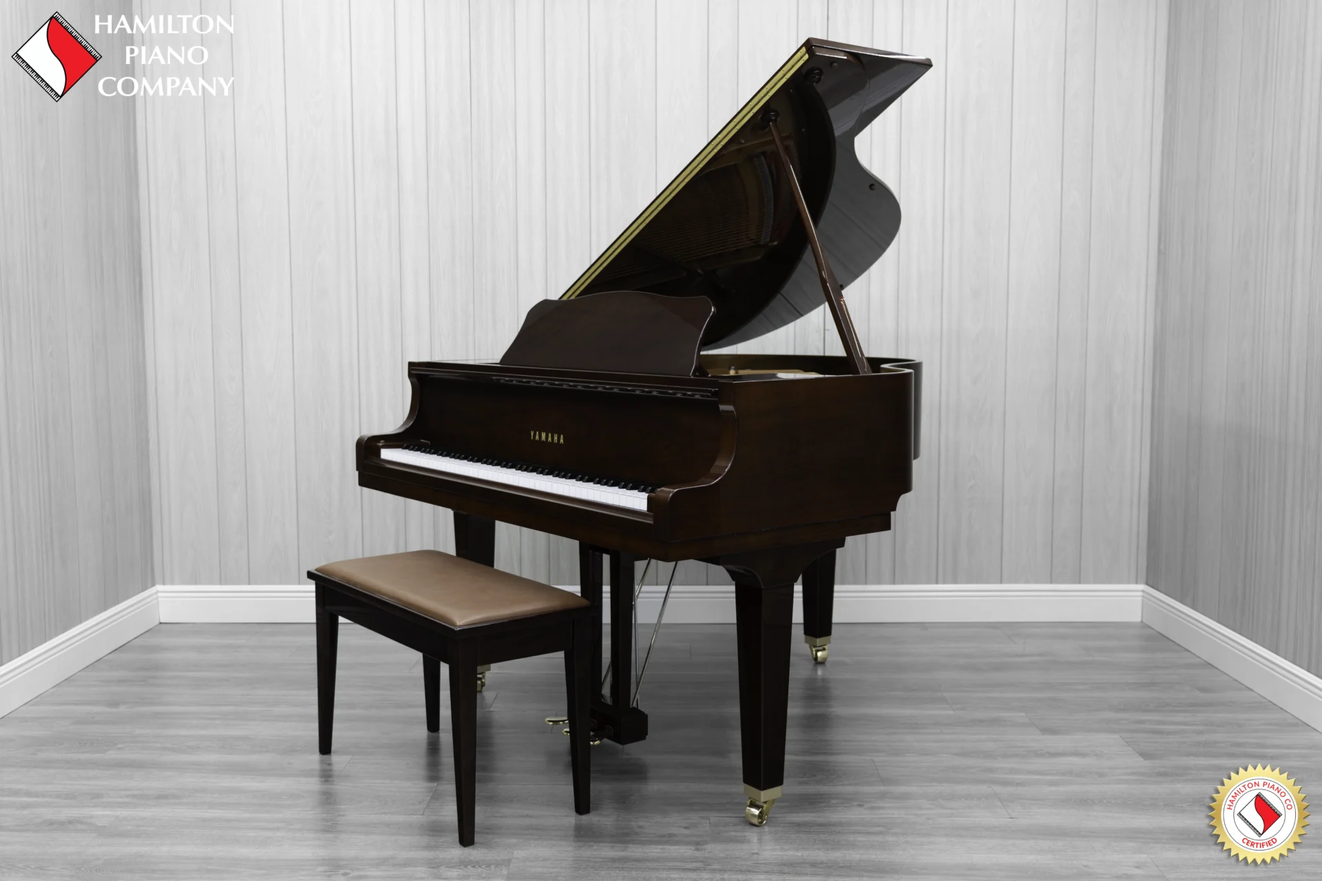 Yamaha GB1K baby grand piano in high-polish mahogany finish.