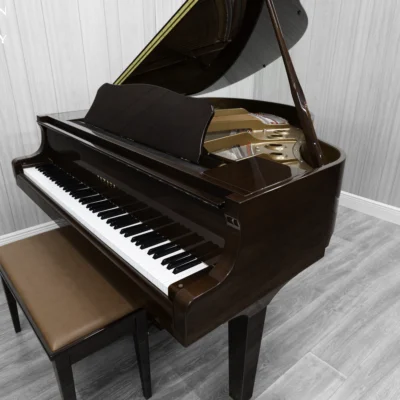 Yamaha GB1K baby grand piano in high-polish mahogany finish.