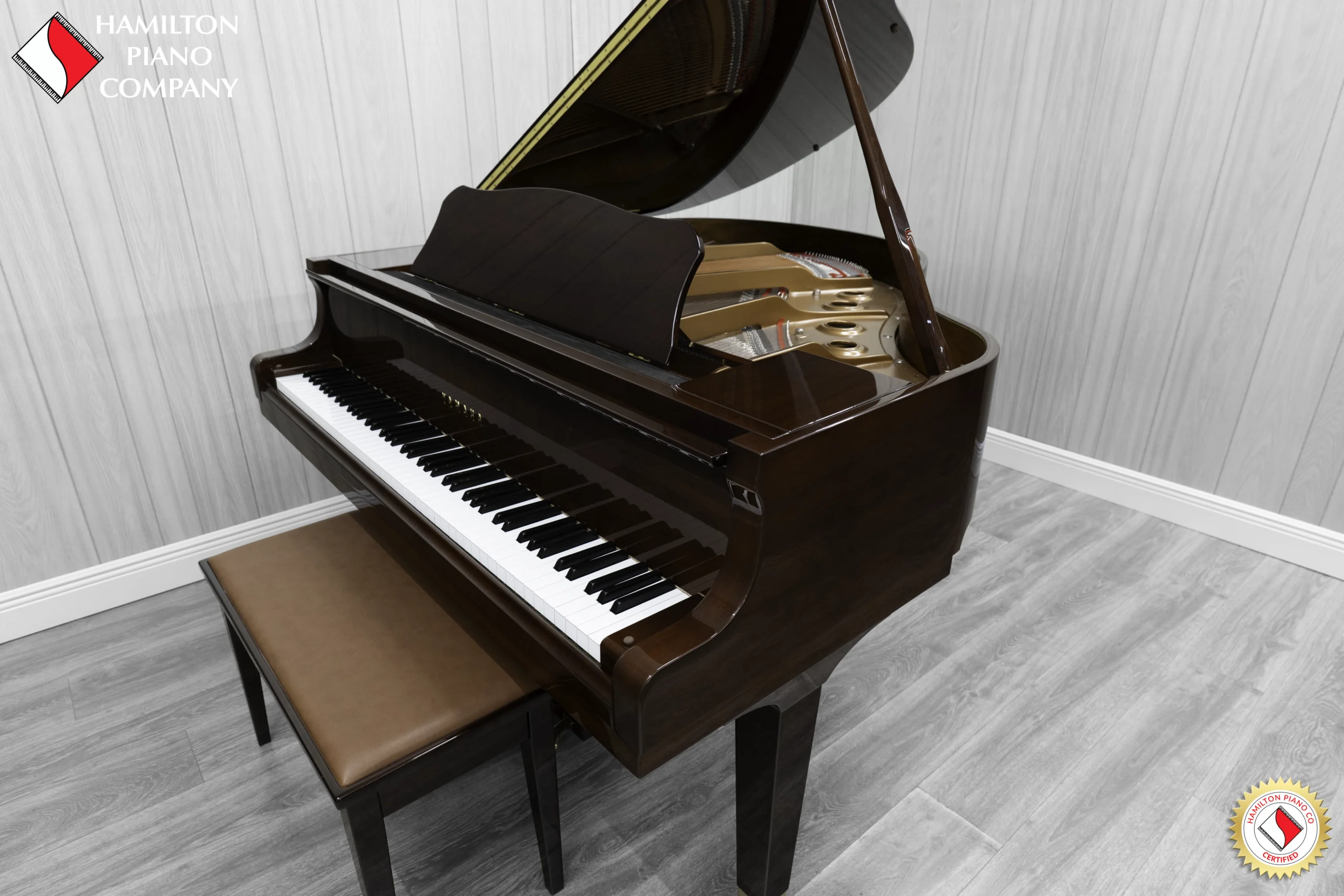 Yamaha GB1K baby grand piano in high-polish mahogany finish.