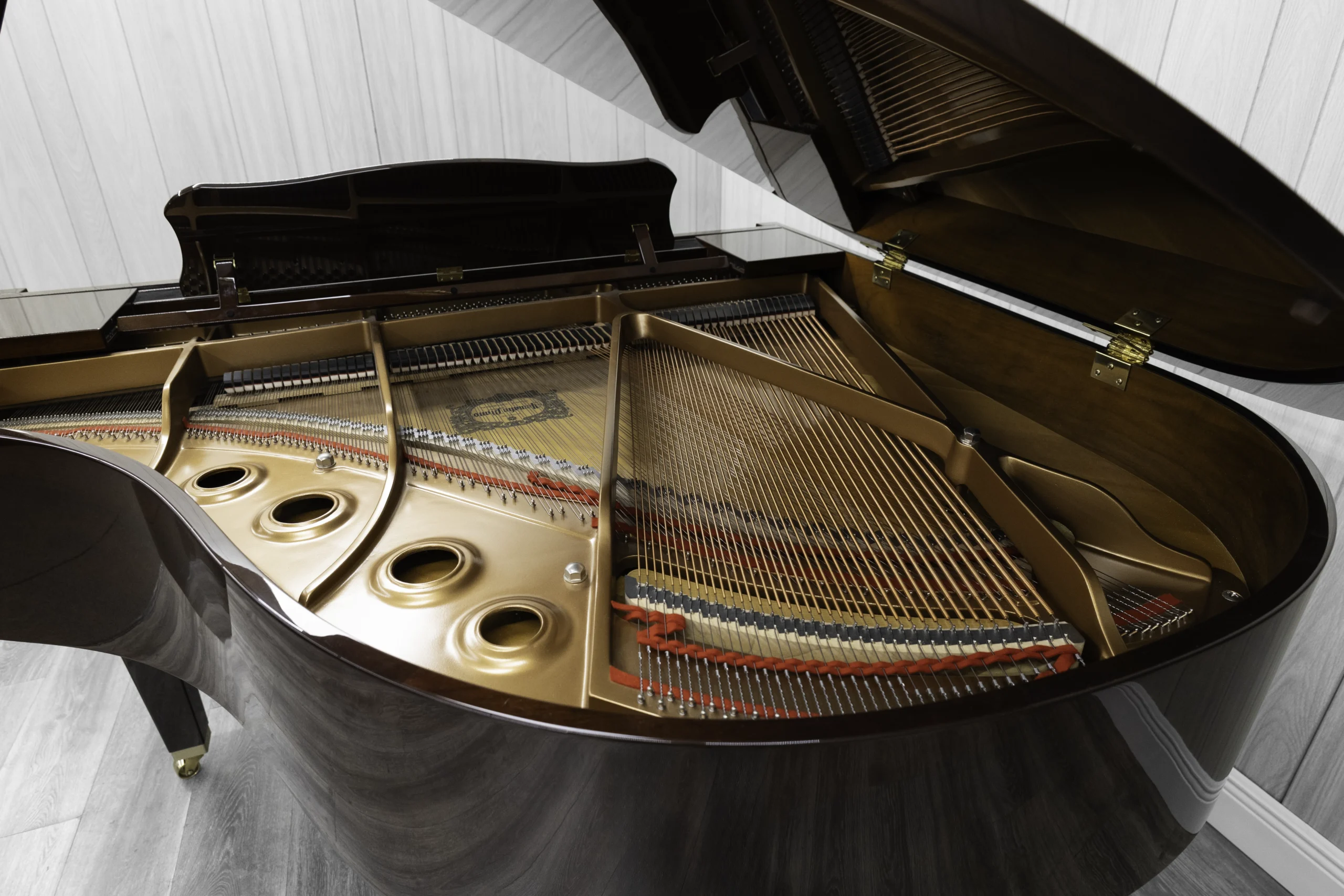 Yamaha GB1K baby grand piano in high-polish mahogany finish.
