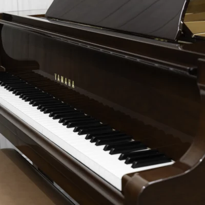 Yamaha GB1K baby grand piano in high-polish mahogany finish.